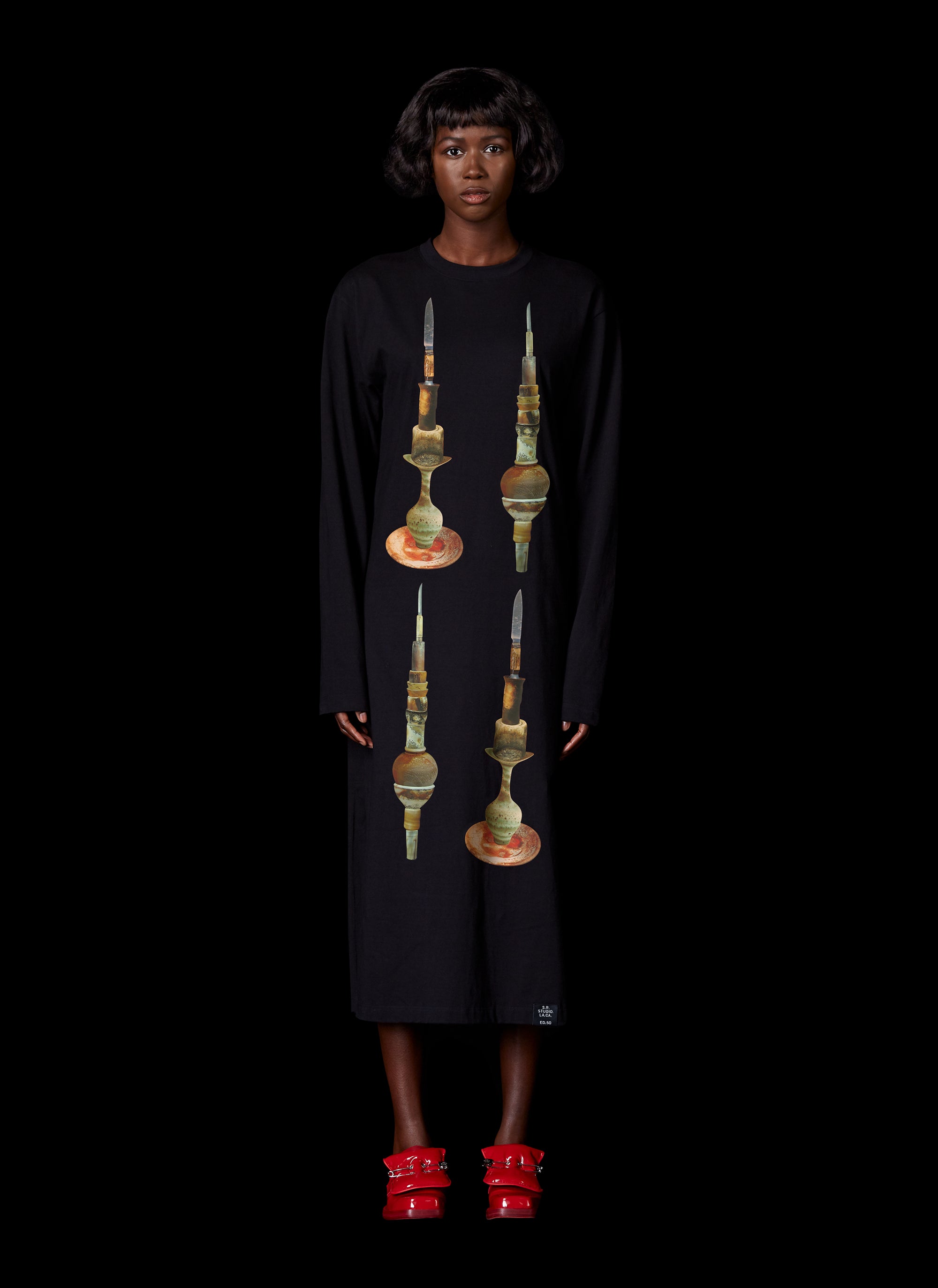 ED. 50 CREWNECK LONG SLEEVE DRESS WITH BALANCE STACK OF POTTERY AND KNIFE